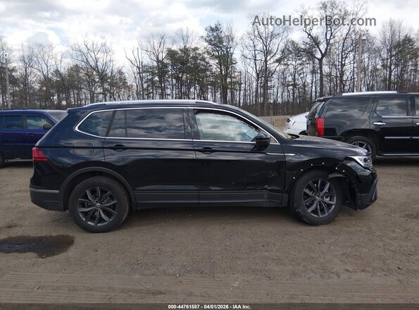 3VVMB7AX7PM124341 2023 VOLKSWAGEN TIGUAN Black Rear interior view