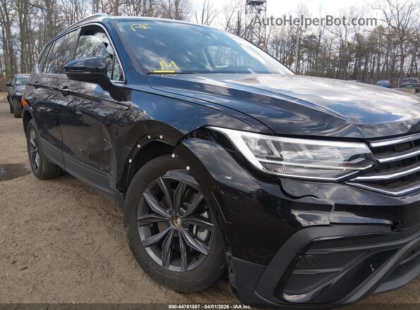 3VVMB7AX7PM124341 2023 VOLKSWAGEN TIGUAN Black Front view