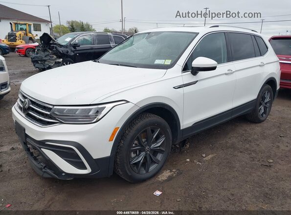3VVMB7AX8PM024376 2023 VOLKSWAGEN TIGUAN White Vista tres cuartos delantera izquierda