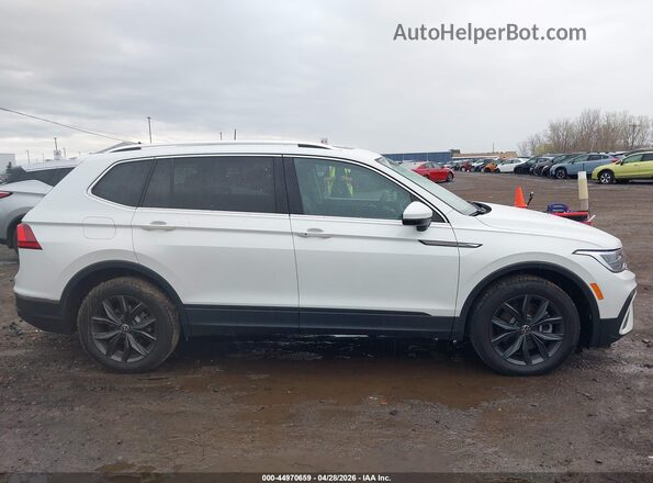 3VVMB7AX8PM024376 2023 VOLKSWAGEN TIGUAN White Vista interior trasera