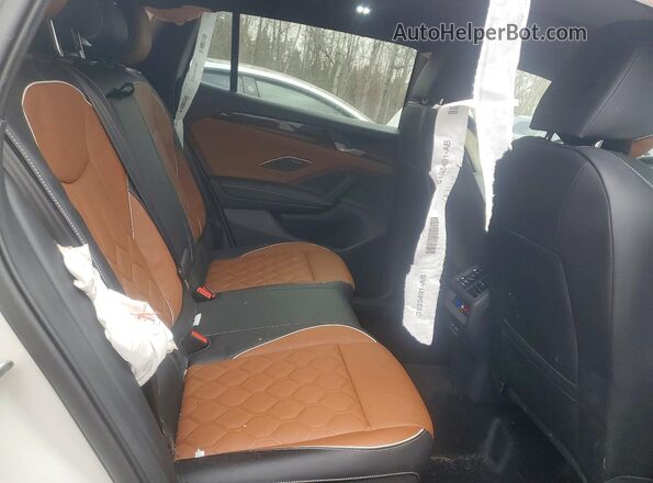 3VVUW7RM5TM033786 2026 VOLKSWAGEN TIGUAN Cream Widok wnętrza z tyłu