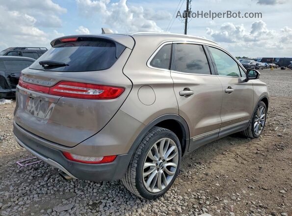 5LMCJ3C96JUL18679 2018 LINCOLN MKC Желто-коричневый Передняя правая четверть