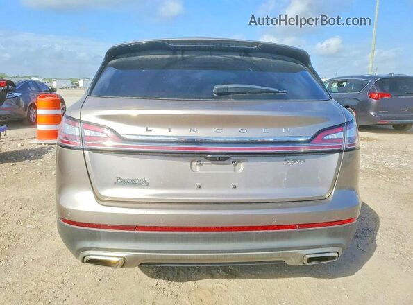 2LMPJ6K92KBL18911 2019 LINCOLN NAUTILUS Tan Widok wnętrza z przodu
