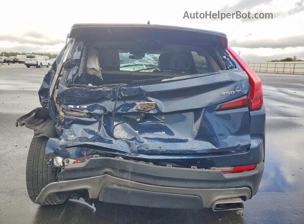 1GYFZCR43MF028086 2021 CADILLAC XT4 Синий Вид салона спереди