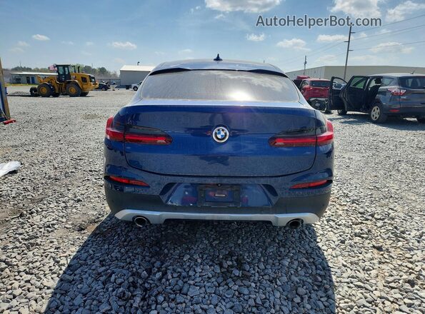 5UX2V1C02L9B53802 2020 BMW X4 Blue Widok wnętrza z przodu