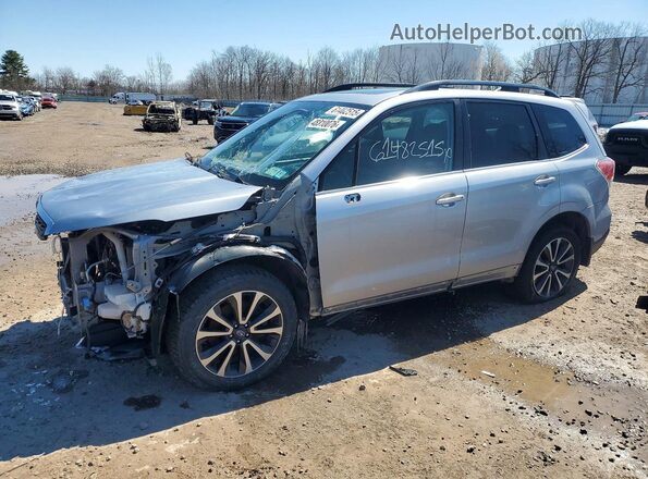 JF2SJGTC9HH425302 2017 SUBARU FORESTER2. Серебряный Задняя левая четверть