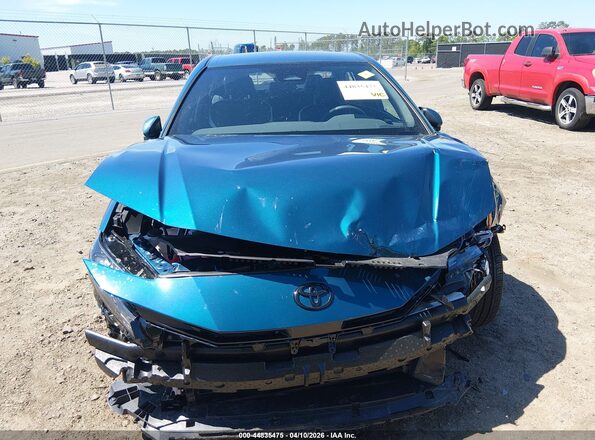 4T1DAACK1TU654922 2026 TOYOTA CAMRY Blue Вид задньої частини салону
