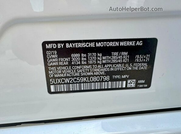 5UXCW2C59KL080798 2019 BMW X7 White Widok wnętrza z tyłu