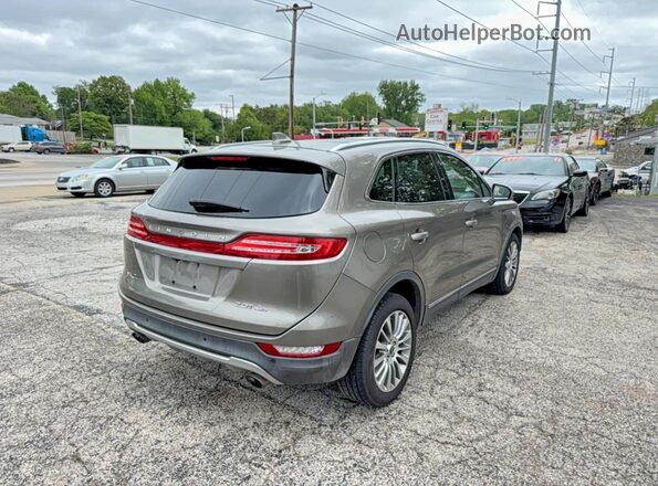 5LMCJ3D90HUL69989 2017 LINCOLN MKC Brown Вид спереду