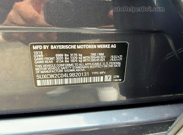 5UXCW2C04L9B20131 2020 BMW X7 Серый Вид задней части салона