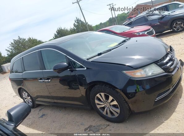 5FNRL5H61HB017472 2017 HONDA ODYSSEY Black Widok wnętrza z tyłu