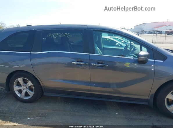 5FNRL6H70JB050452 2018 HONDA ODYSSEY Gray Vista interior trasera