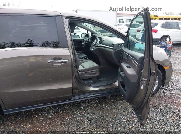 5FNRL6H77JB094495 2018 HONDA ODYSSEY Brown Widok wnętrza z przodu