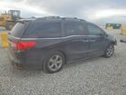 2018 Honda Odyssey Exl Черный vin: 5FNRL6H7XJB047817