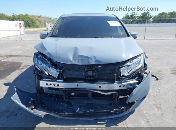 5FNRL6H89RB036411 2024 HONDA ODYSSEY Серый Вид задней части салона