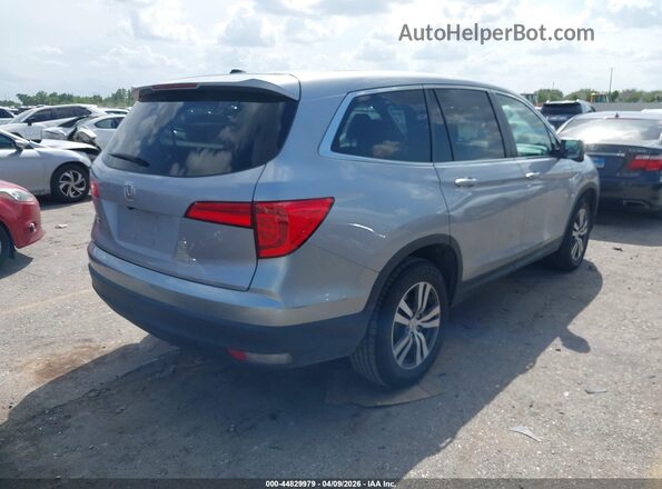 5FNYF5H59JB024993 2018 HONDA PILOT Серебряный Задняя правая четверть
