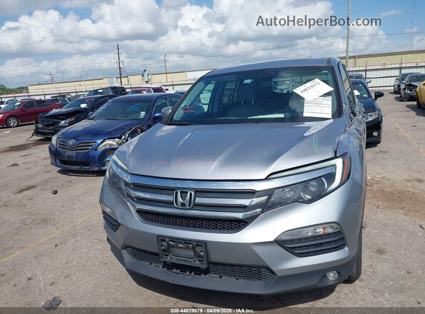 5FNYF5H59JB024993 2018 HONDA PILOT Серебряный Вид щитка приборов