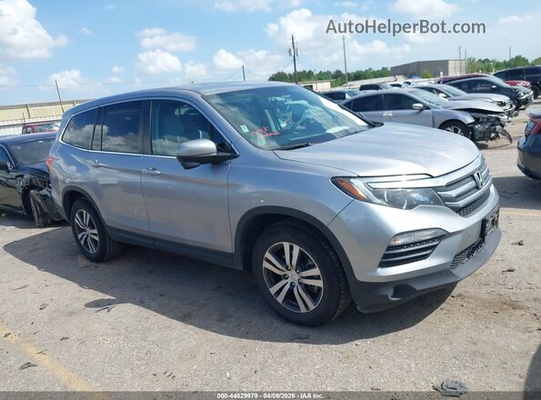5FNYF5H59JB024993 2018 HONDA PILOT Серебряный Вид задней части салона