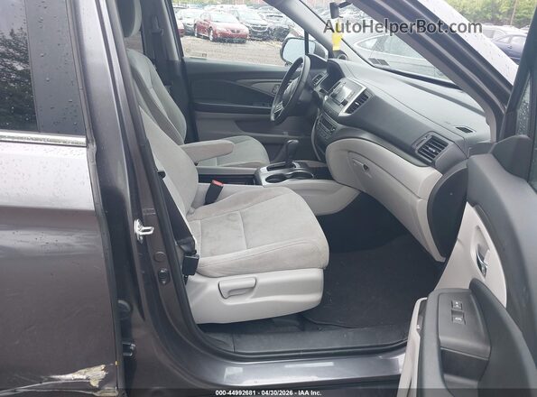 5FNYF6H11KB010378 2019 HONDA PILOT Серый Вид салона спереди
