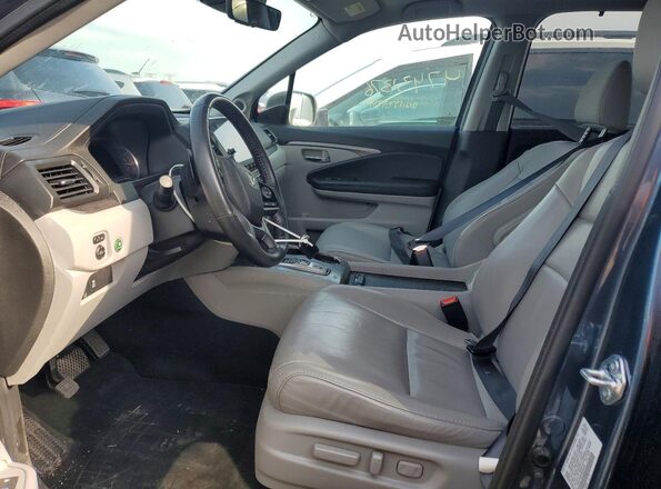 5FNYF6H26MB044067 2021 HONDA PILOT Синий Вид салона спереди