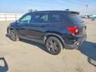 2019 Honda Passport Exl Черный vin: 5FNYF8H55KB025268