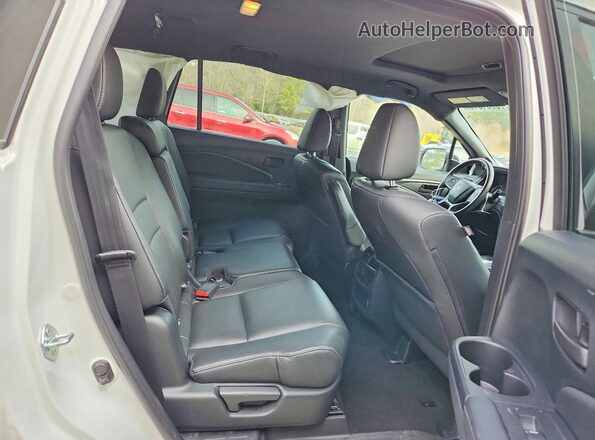 5FNYF8H57NB020626 2022 HONDA PASSPORT Белый Вид задней части салона