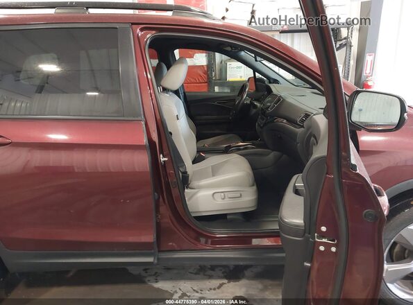 5FNYF8H96KB015237 2019 HONDA PASSPORT Maroon წინა სალონის ხედი