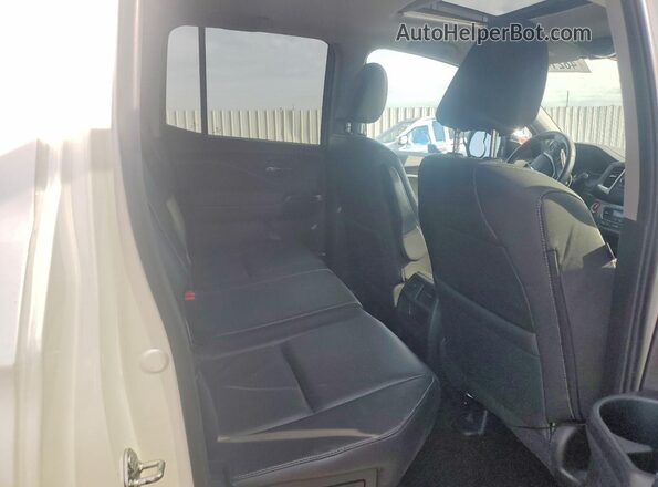 5FPYK3F57KB018492 2019 HONDA RIDGELINE White Vista interior trasera