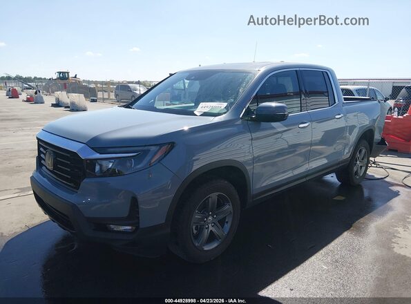 5FPYK3F71PB063405 2023 HONDA RIDGELINE Light Blue Przód lewy