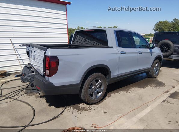 5FPYK3F71PB063405 2023 HONDA RIDGELINE Light Blue Tył prawy