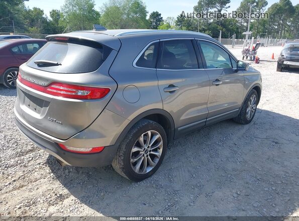 5LMCJ2D92HUL40066 2017 LINCOLN MKC Tan Tył prawy