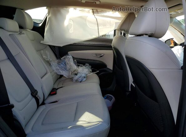 5NMJC3AE0NH076882 2022 HYUNDAI TUCSON Gray Rear interior view
