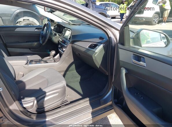 5NPE34AF3KH772750 2019 HYUNDAI SONATA Серый Вид салона спереди
