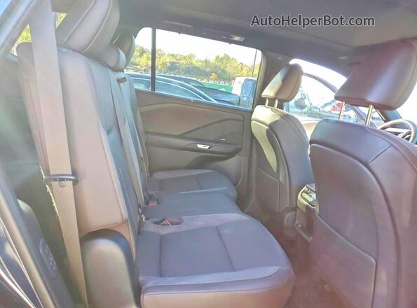 5TDAAAB66SS027972 2025 LEXUS TX Black Widok wnętrza z tyłu