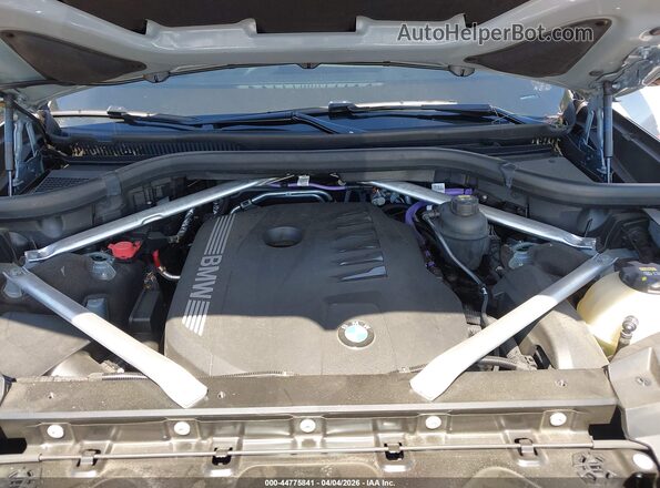 5UX23EM01P9N85182 2023 BMW X7 Gray Vista trasera