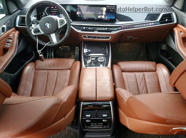 5UX23EM06P9R80586 2023 BMW X7 Темно-бордовый Вид панели приборов