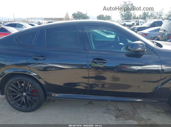 5UX33EX02S9X27273 2025 BMW X6 Черный Вид задней части салона