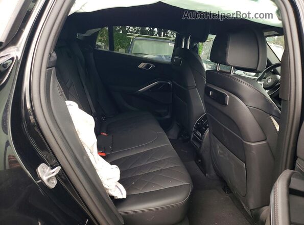 5UX33EX02S9X29007 2025 BMW X6 Черный Вид задней части салона