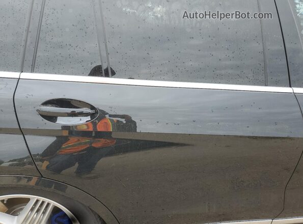5UX43EM06S9Y70980 2025 BMW X7 Charcoal Vista de los asientos traseros