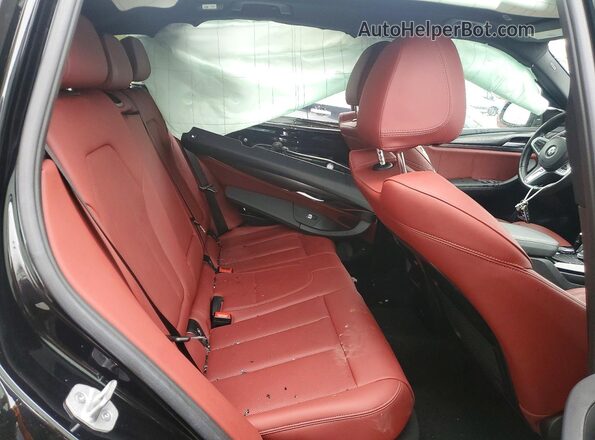 5UX53DP04R9T79375 2024 BMW X3 Черный Вид задней части салона