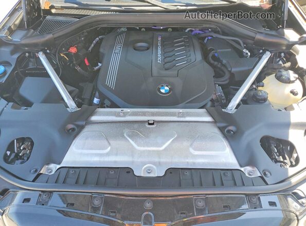 5UX83DP03P9T27018 2023 BMW X3 Black Вид задньої частини салону