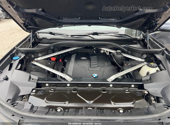 5UXCW2C04L9B20131 2020 BMW X7 Gray Widok z tyłu