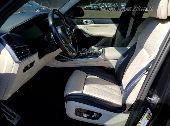 5UXCW2C51KLB43654 2019 BMW X7 Черный Вид салона спереди