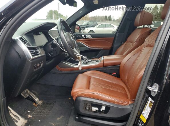 5UXCW2C59KL082180 2019 BMW X7 Черный Вид салона спереди