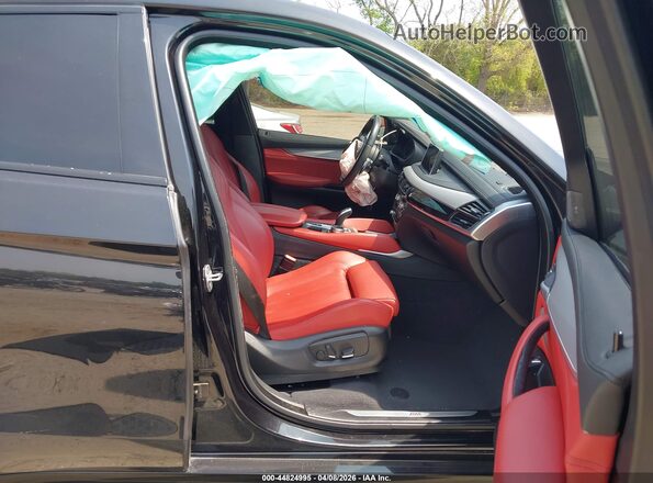 5UXKU2C52K0Z65248 2019 BMW X6 Black Vista interior delantera