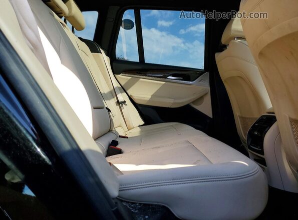 5UXTR9C59KLE21703 2019 BMW X3 Black Vista interior trasera