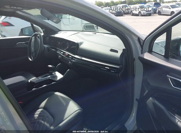 5XYK6CDFXTG350581 2026 KIA SPORTAGE Gray Widok wnętrza z przodu