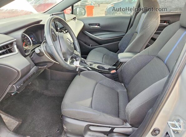 5YFS4MCE1NP129163 2022 TOYOTA LL Silver Front interior view