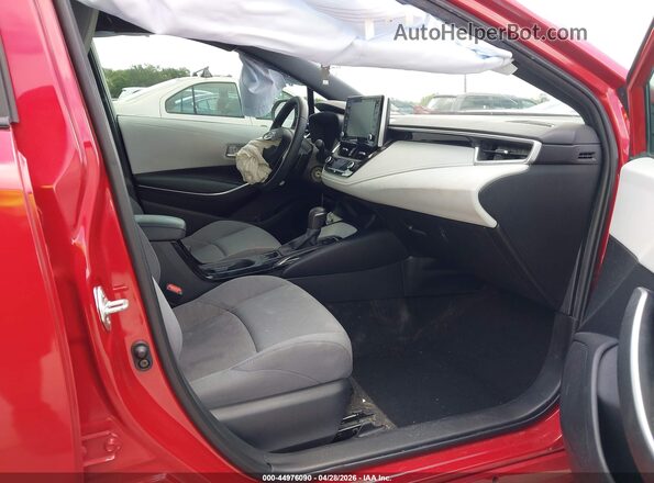 5YFS4MCE7MP072174 2021 TOYOTA LL Burgundy წინა სალონის ხედი