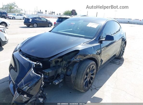5YJYGDEE9MF073594 2021 TESLA MODEL Y Black Вид спереду